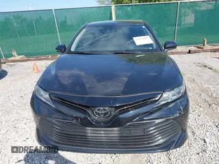 2019 Toyota Camry LE with VIN 4T1B11HK1KU718374, listed as a IAAI auction lot 42071905 with 86,460 mi miles and . Bid and sale history available at DreamBid. Image 6.