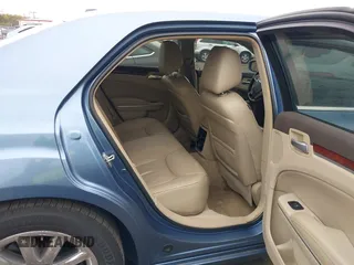 2011 Chrysler 300 with VIN 2C3CA6CT5BH575023, listed as a IAAI auction lot 42090856 with 200,309 mi miles. Bid and sale history available at carsss.com. Image 8.