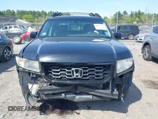 2010 Honda Ridgeline RTL z VIN 5FPYK1F56AB003730, wystawiony jako IAAI lot #42255351 z przebiegiem 190 630 mil mil oraz . Historia ofert i sprzedaży dostępna na DreamBid. Obrazek 12.