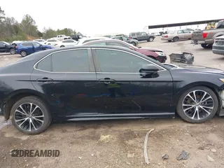 2019 Toyota Camry LE z VIN 4T1B11HK7KU774951, wystawiony jako IAAI lot #41349009 z przebiegiem 189 711 mil mil oraz . Historia ofert i sprzedaży dostępna na DreamBid. Obrazek 14.