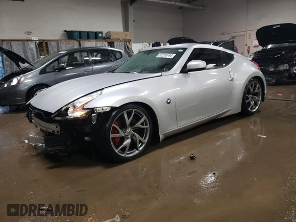 2014 Nissan 370Z Nismo with VIN JN1AZ4EH2EM636132, listed as a Copart auction lot 87218744 with 39,254 mi miles and Salvage Title. Bid and sale history available at DreamBid. Image 1.