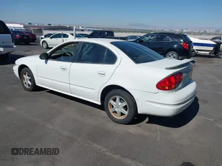 2003 Oldsmobile Alero GL1 z VIN 1G3NL52F53C323443, wystawiony jako IAAI lot #42271207 z przebiegiem 138 180 mil mil oraz . Historia ofert i sprzedaży dostępna na DreamBid. Obrazek 3.