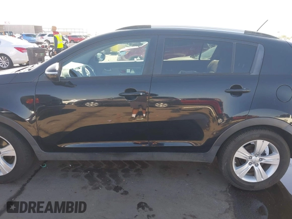 2012 Kia Sportage LX z VIN KNDPB3A28C7260006, wystawiony jako IAAI lot #42604839 z przebiegiem 171 424 mil mil oraz . Historia ofert i sprzedaży dostępna na DreamBid. Obrazek 14.