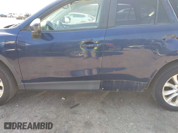 2014 Mazda CX-5 Grand Touring with VIN JM3KE4DYXE0342720, listed as a IAAI auction lot 42026388 with 114,072 mi miles and . Bid and sale history available at carsss.com. Image 15.