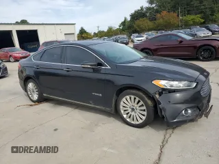 2015 Ford Fusion SE Hybrid with VIN 3FA6P0LU2FR310637, listed as a Copart auction lot 75388924 with 259,077 mi miles and Salvage title. Bid and sale history available at DreamBid. Image 4.