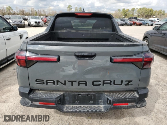 2023 Hyundai Santa Cruz SEL with VIN 5NTJB4AE5PH040718, listed as a Copart auction lot 41083834 with 14,809 mi miles and Salvage title. Bid and sale history available at DreamBid. Image 6.