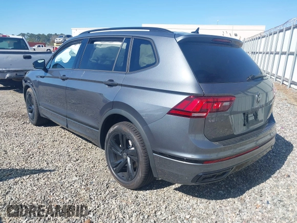 2024 Volkswagen Tiguan SE R-Line Black with VIN 3VVCB7AX2RM114556, listed as a IAAI auction lot 41887373 with 7,013 mi miles and . Bid and sale history available at DreamBid. Image 3.