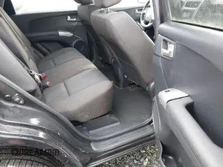 2010 Kia Sportage LX with VIN KNDKGCA33A7706645, listed as a IAAI auction lot 41387232 with 178,714 mi miles and . Bid and sale history available at carsss.com. Image 8.