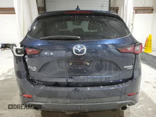 2022 Mazda CX-5 2.5 Turbo with VIN JM3KFBAY1N0636626, listed as a Copart auction lot 52257685 with 41,329 mi miles and Salvage Title. Bid and sale history available at carsss.com. Image 6.