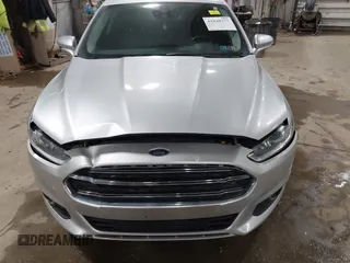 2014 Ford Fusion SE Hybrid with VIN 3FA6P0LU8ER183231, listed as a IAAI auction lot 41848377 with 130,496 mi miles. Bid and sale history available at carsss.com. Image 6.
