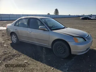 2002 Honda Civic EX with VIN 1HGES25712L014218, listed as a Copart auction lot 52325265 with 206,919 mi miles and Salvage Title. Bid and sale history available at DreamBid. Image 4.