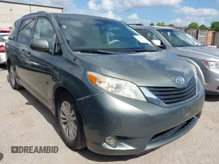 2014 Toyota Sienna XLE with VIN 5TDYK3DC2ES448876, listed as a IAAI auction lot 42519351 with 154,601 mi miles and . Bid and sale history available at DreamBid. Image 1.