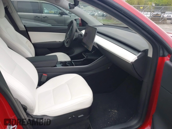 2021 Tesla Model Y Long Range with VIN 5YJYGDEE5MF085032, listed as a IAAI auction lot 41982925 with 64,541 mi miles and . Bid and sale history available at DreamBid. Image 5.