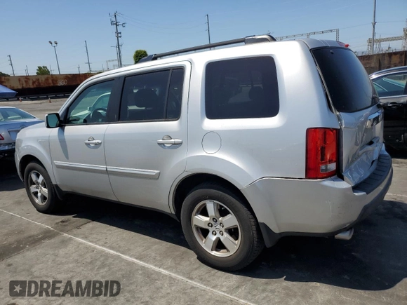 2009 Honda Pilot EX-L with VIN 5FNYF48649B028206, listed as a Copart auction lot 54773965 with 167,134 mi miles and Salvage Title. Bid and sale history available at carsss.com. Image 2.