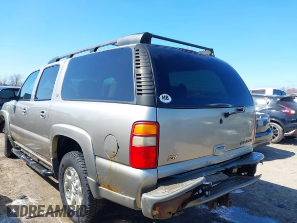 2003 Chevrolet Suburban Z71 with VIN 3GNFK16Z33G253479, listed as a IAAI auction lot 41871504 with 157,990 mi miles and . Bid and sale history available at DreamBid. Image 3.