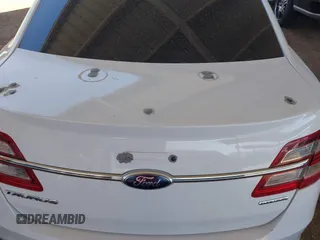 2014 Ford Taurus SE с VIN 1FAHP2D8XEG170512, выставлен на аукционе IAAI как лот 42142683 с пробегом 198 526 миль миль и . История ставок и продаж доступна на DreamBid. Изображение 6.