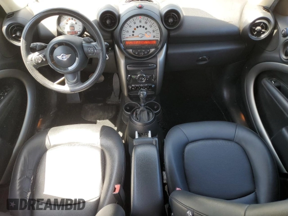 2014 MINI Countryman with VIN WMWZB3C54EWR39731, listed as a Copart auction lot 63635215 with 85,751 mi miles and Salvage title. Bid and sale history available at DreamBid. Image 8.