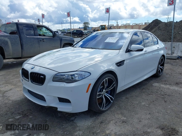2013 BMW M5 with VIN WBSFV9C56DC772961, listed as a IAAI auction lot 41765457 with 104,568 mi miles. Bid and sale history available at carsss.com. Image 17.