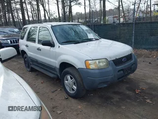 2003 Ford Escape XLS Popular with VIN 1FMYU021X3KC76123, listed as a IAAI auction lot 41844824 with 185,036 mi miles. Bid and sale history available at carsss.com. Image 1.