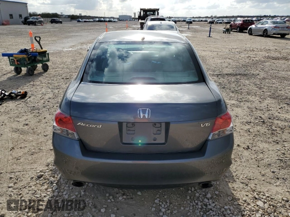 2010 Honda Accord EX-L z VIN 1HGCP3F86AA000301, wystawiony jako Copart lot #84867284 z przebiegiem Nie podano mil oraz Szkoda całkowita • Salvage title. Historia ofert i sprzedaży dostępna na DreamBid. Obrazek 6.