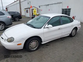 1997 Ford Taurus LX z VIN 1FALP53S0VG291879, wystawiony jako IAAI lot #42498197 z przebiegiem 266 886 mil mil oraz . Historia ofert i sprzedaży dostępna na DreamBid. Obrazek 6.