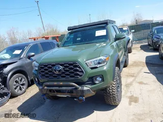 2021 Toyota Tacoma 4WD SR with VIN 3TMCZ5ANXMM382874, listed as a IAAI auction lot 41965388 with 62,178 mi miles. Bid and sale history available at carsss.com. Image 13.