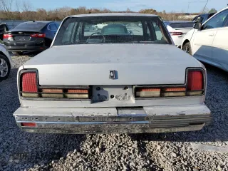 1991 Oldsmobile Delta z VIN 1G3HN54C2M1809327, wystawiony jako Copart lot #84694064 z przebiegiem 225 092 mil mil oraz Szkody całkowita. Historia ofert i sprzedaży dostępna na DreamBid. Obrazek 6.