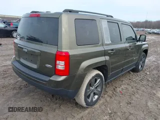 2015 Jeep Patriot High Altitude with VIN 1C4NJPFAXFD342049, listed as a IAAI auction lot 41693119 with 127,259 mi miles and . Bid and sale history available at DreamBid. Image 4.
