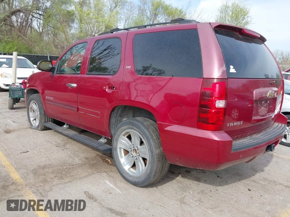 2007 Chevrolet Tahoe LTZ with VIN 1GNFK130X7R319974, listed as a IAAI auction lot 41955206 with 187,445 mi miles and . Bid and sale history available at DreamBid. Image 3.