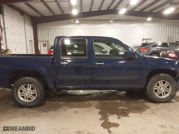 2012 Chevrolet Colorado LT w/1LT with VIN 1GCHTCFE0C8105626, listed as a IAAI auction lot 41559244 with 147,731 mi miles. Bid and sale history available at carsss.com. Image 14.