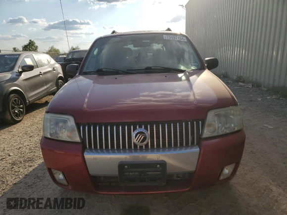 2005 Mercury Mariner Luxury z VIN 4M2YU56175DJ33563, wystawiony jako Copart lot #73497134 z przebiegiem 152 513 mil mil oraz Szkody całkowita. Historia ofert i sprzedaży dostępna na DreamBid. Obrazek 5.