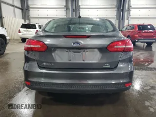 2018 Ford Focus SE z VIN 1FADP3FE4JL289830, wystawiony jako Copart lot #53350265 z przebiegiem 72 963 mil mil oraz Szkoda całkowita • Salvage title. Historia ofert i sprzedaży dostępna na DreamBid. Obrazek 6.