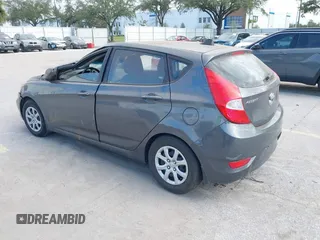 2012 Hyundai Accent GS with VIN KMHCT5AE7CU050253, listed as a IAAI auction lot 40601479 with 88,734 mi miles. Bid and sale history available at carsss.com. Image 3.