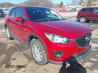 2016 Mazda CX-5 Touring with VIN JM3KE4CY4G0860035, listed as a IAAI auction lot 41678299 with 72,101 mi miles. Bid and sale history available at carsss.com. Image 1.