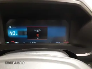2022 Ford F-150 Lightning Pro с VIN 1FT6W1EV2NWG01661, выставлен на аукционе IAAI как лот 41785750 с пробегом 21 156 миль миль и . История ставок и продаж доступна на DreamBid. Изображение 7.