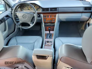 1993 Mercedes-Benz E Class with VIN WDBEA32E9PB936886, listed as a Copart auction lot 86800894 with 115,217 mi miles and Salvage Title. Bid and sale history available at carsss.com. Image 8.