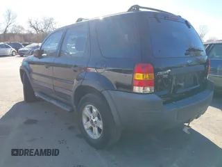 2007 Ford Escape XLT with VIN 1FMYU03137KA69934, listed as a IAAI auction lot 41007739 with 193,956 mi miles and . Bid and sale history available at DreamBid. Image 3.