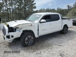 2023 Toyota Tacoma SR5 z VIN 3TMAZ5CN2PM217085, wystawiony jako Copart lot #53563675 z przebiegiem 7 389 mil mil oraz Szkoda całkowita • Salvage title. Historia ofert i sprzedaży dostępna na DreamBid. Obrazek 1.