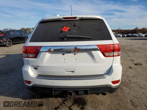 2013 Jeep Grand Cherokee Overland with VIN 1C4RJFCG5DC639401, listed as a Copart auction lot 79003094 with 0 mi miles and Salvage Title. Bid and sale history available at carsss.com. Image 6.