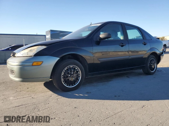 2000 Ford Focus LX with VIN 1FAFP33P8YW216936, listed as a Copart auction lot 83038404 with 120,298 mi miles and Salvage Title. Bid and sale history available at DreamBid. Image 1.