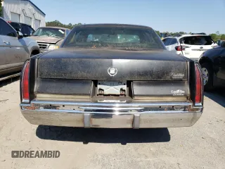 1994 Cadillac Fleetwood z VIN 1G6DW52PXRR704063, wystawiony jako Copart lot #75345394 z przebiegiem 96 067 mil mil oraz Szkody całkowita. Historia ofert i sprzedaży dostępna na DreamBid. Obrazek 6.