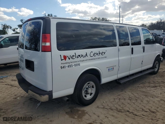 2017 Chevrolet Express Passenger LT with VIN 1GAZGPFF7H1134008, listed as a Copart auction lot 82833454 with 43,877 mi miles and Salvage Title. Bid and sale history available at carsss.com. Image 3.