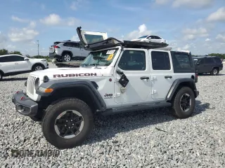 2018 Jeep Wrangler Unlimited Rubicon with VIN 1C4HJXFG4JW133534, listed as a Copart auction lot 63745235 with 130,873 mi miles and Salvage title. Bid and sale history available at DreamBid. Image 1.