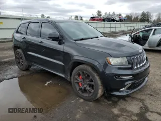 2012 Jeep Grand Cherokee SRT8 with VIN 1C4RJFDJ4CC350907, listed as a Copart auction lot 49409205 with 171,352 mi miles and Clean Title. Bid and sale history available at carsss.com. Image 4.