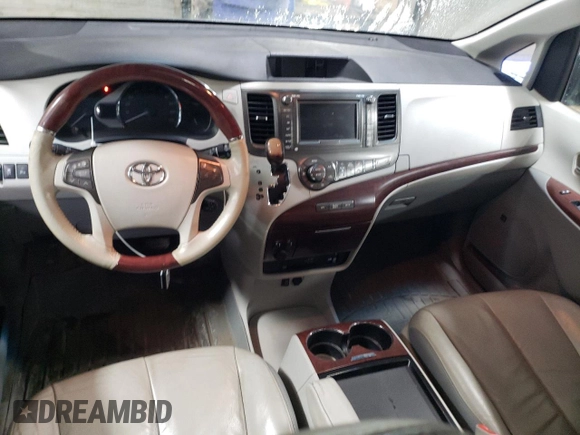 2011 Toyota Sienna XLE AAS with VIN 5TDYK3DC0BS174864, listed as a Copart auction lot 50387005 with 218,938 mi miles and Salvage Title. Bid and sale history available at DreamBid. Image 8.