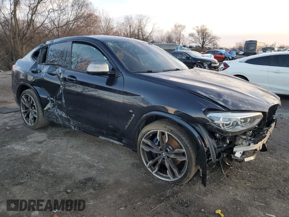 2019 BMW X4 M40i z VIN 5UXUJ5C5XKLA93583, wystawiony jako Copart lot #84643664 z przebiegiem Nie podano mil oraz Szkoda całkowita • Salvage title. Historia ofert i sprzedaży dostępna na DreamBid. Obrazek 4.