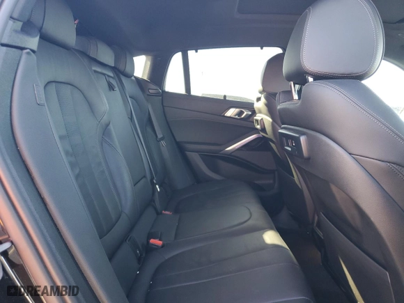 2021 BMW X6 xDrive40i with VIN 5UXCY6C07M9D94944, listed as a Copart auction lot 77106334 with 52,106 mi miles and Salvage Title. Bid and sale history available at carsss.com. Image 11.