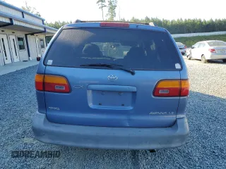 1999 Toyota Sienna LE with VIN 4T3ZF13C8XU108650, listed as a Copart auction lot 74476004 with 215,060 mi miles and Salvage Title. Bid and sale history available at carsss.com. Image 6.