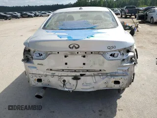 2014 Infiniti Q50 Premium with VIN JN1BV7AR2EM700072, listed as a Copart auction lot 54934445 with 97,381 mi miles and Salvage title. Bid and sale history available at DreamBid. Image 6.