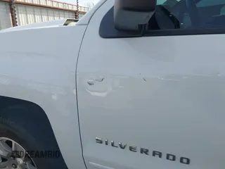 2017 Chevrolet Silverado 1500 LT with VIN 3GCUKREC5HG414935, listed as a IAAI auction lot 41064938 with 197,767 mi miles and . Bid and sale history available at DreamBid. Image 19.